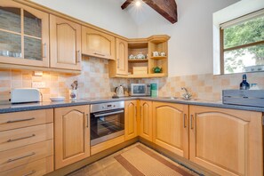 Fridge, microwave, oven, cookware/dishes/utensils