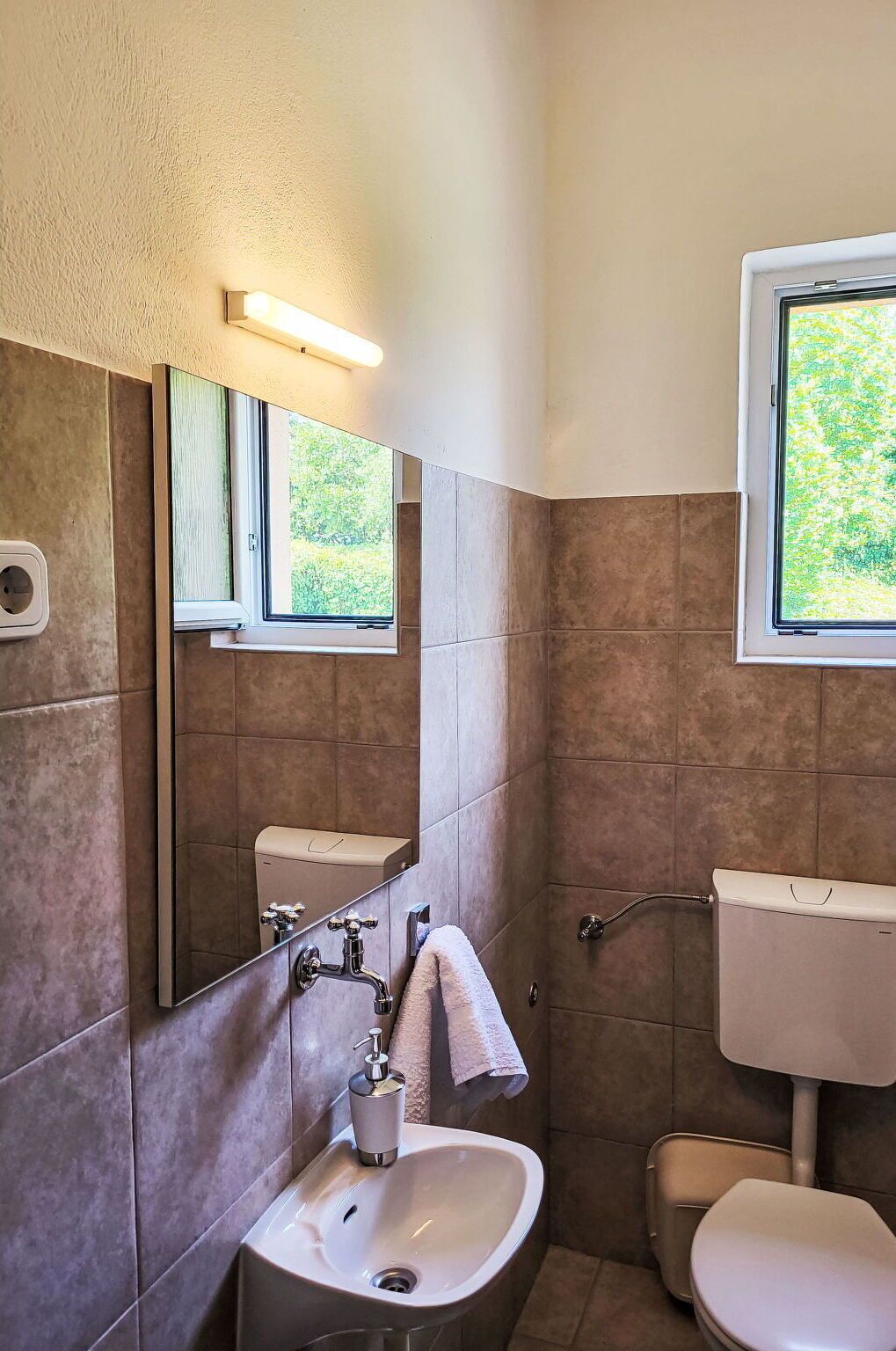 Property, Sink, Tap, Plumbing Fixture, Bathroom Sink, Bathroom, Purple, Mirror, Building, Lighting