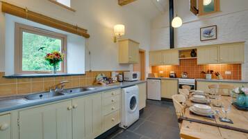 Fridge, microwave, oven, cookware/dishes/utensils