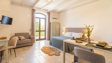 Premium bedding, down duvets, in-room safe, desk