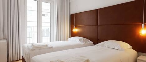 City Apartment, 3 Bedrooms, Kitchenette | Blackout curtains, soundproofing, iron/ironing board