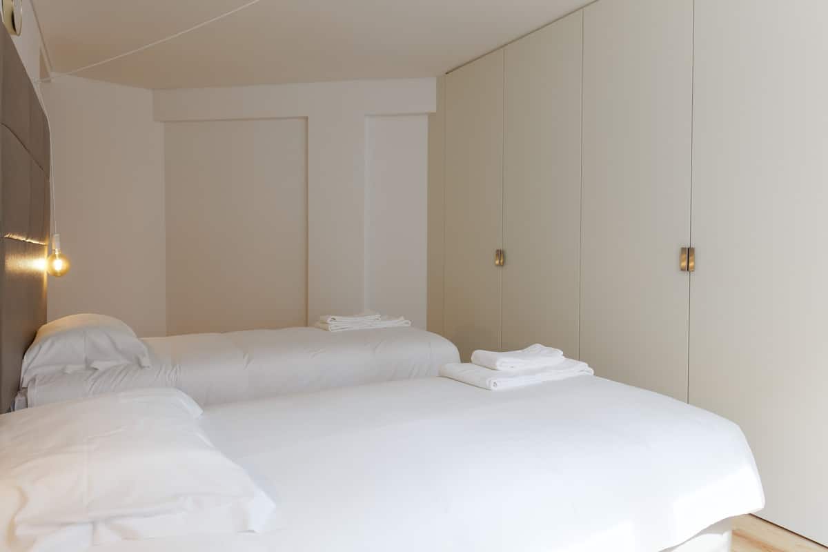 Blackout curtains, soundproofing, iron/ironing board