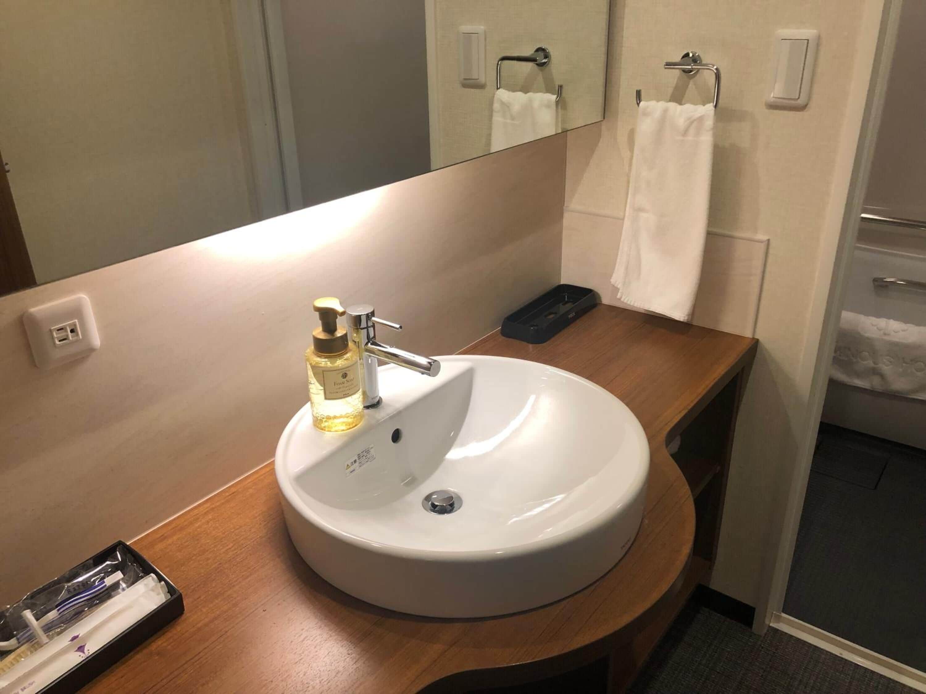 free toiletries, hair dryer, slippers, electronic bidet