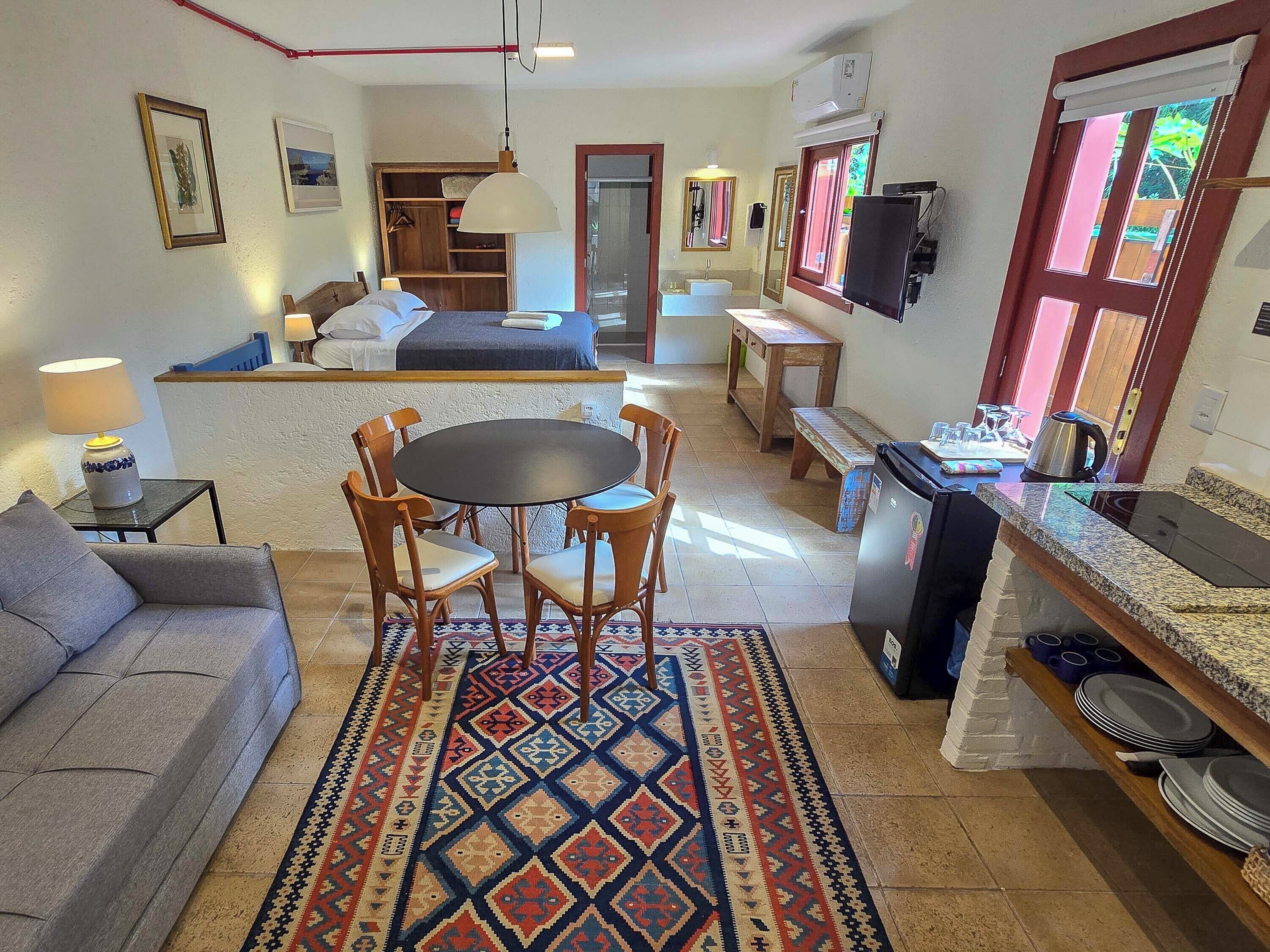 Family Apartment, Multiple Beds, Kitchen, Ground Floor | Minibar, in-room safe, desk, iron/ironing board