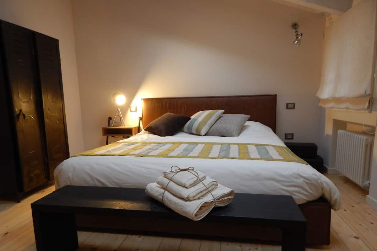 Grand tweepersoonskamer, 1 kingsize bed, uitzicht op tuin (Leccino) | Een bureau, gratis babybedden, gratis wifi, beddengoed