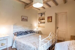 Exclusive Suite, 1 Bedroom, Garden View | 1 bedroom, individually furnished, desk, laptop workspace