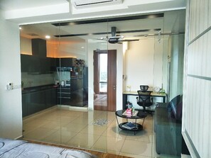 Elite Studio, Multiple Beds, Non Smoking | Living area | Smart TV, video-game console, DVD player