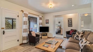 Cabin, 2 Bedrooms | Living area | Flat-screen TV