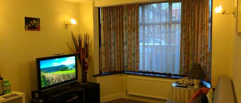 Double Room | Living area | Flat-screen TV