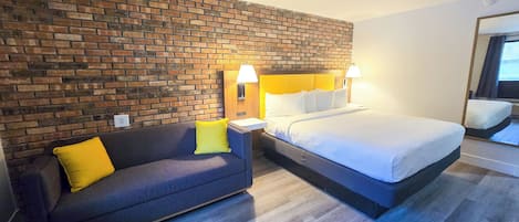 Suite, King Bed w/ Sofabed | Premium bedding, down comforters, blackout drapes, free WiFi