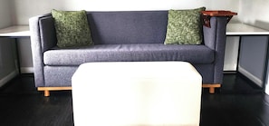 Upper Lodge Suite - King Bed w/ Sofabed | Living area | Flat-screen TV
