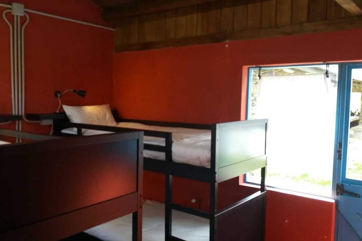 Family Room, Shared Bathroom | Blackout drapes, free WiFi, bed sheets
