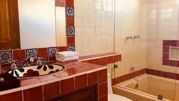 Combined shower/bathtub, deep-soaking bathtub, rainfall showerhead