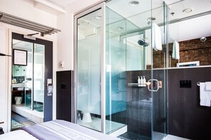 Designer toiletries, hair dryer, bathrobes, slippers