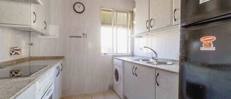 Microwave, oven, coffee/tea maker, cookware/dishes/utensils