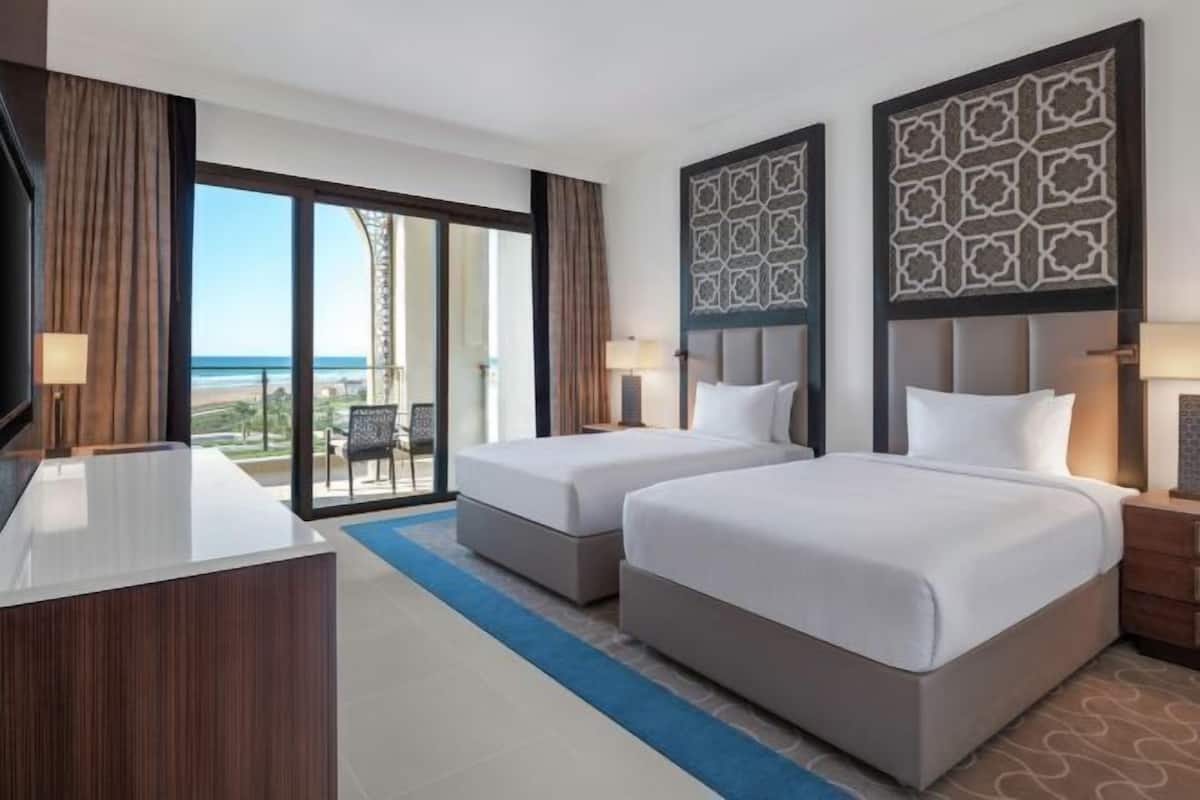 Edredón, camas Select Comfort y minibar
