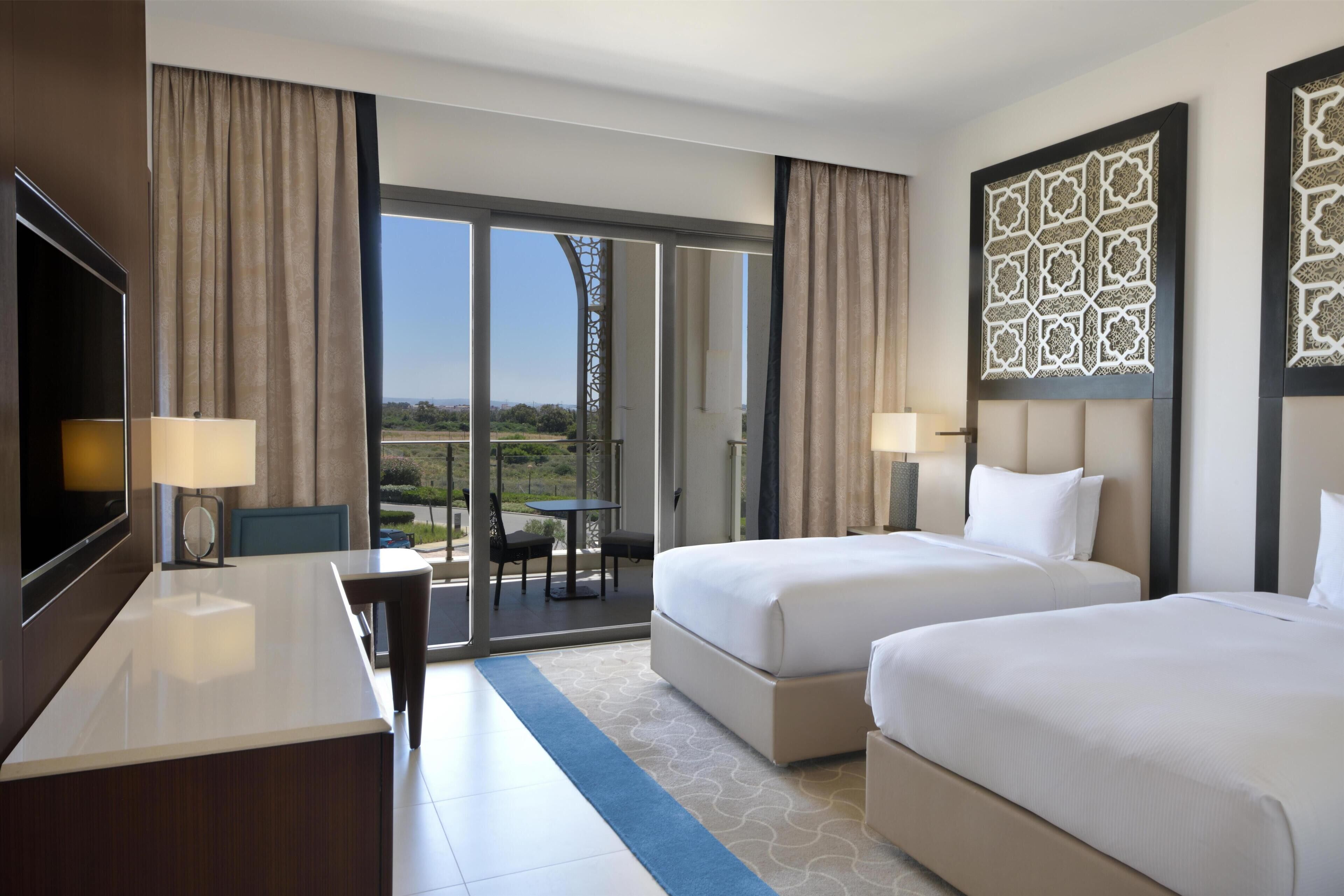 Apartment, 2 Bedrooms | Down comforters, Select Comfort beds, minibar, in-room safe