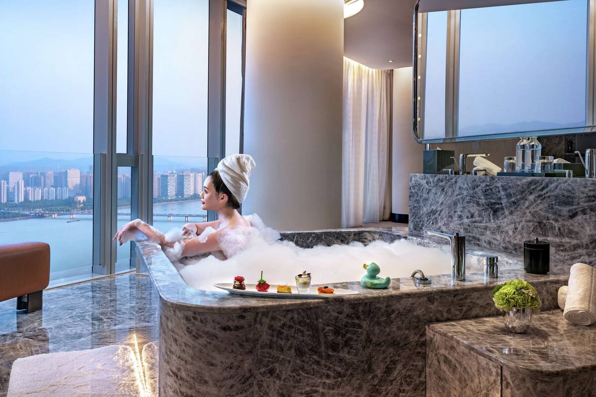 king conrad suite | bathroom | separate bathtub and shower, jetted bath, rainfall showerhead