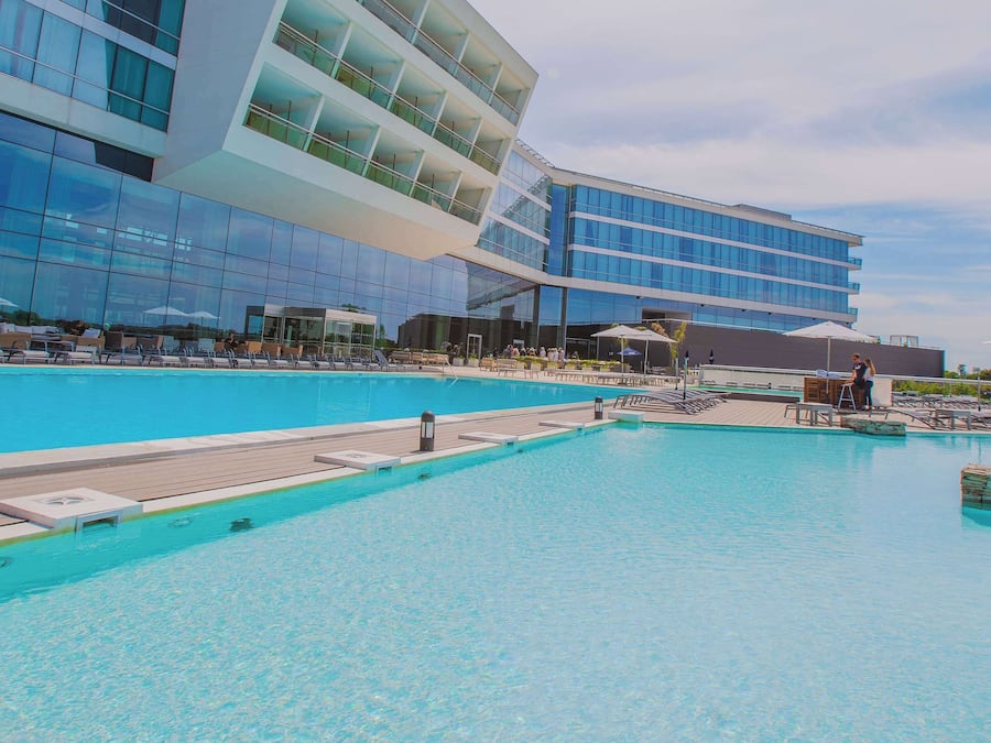 Indoor pool, seasonal outdoor pool, open 10 AM to 8 PM, pool umbrellas