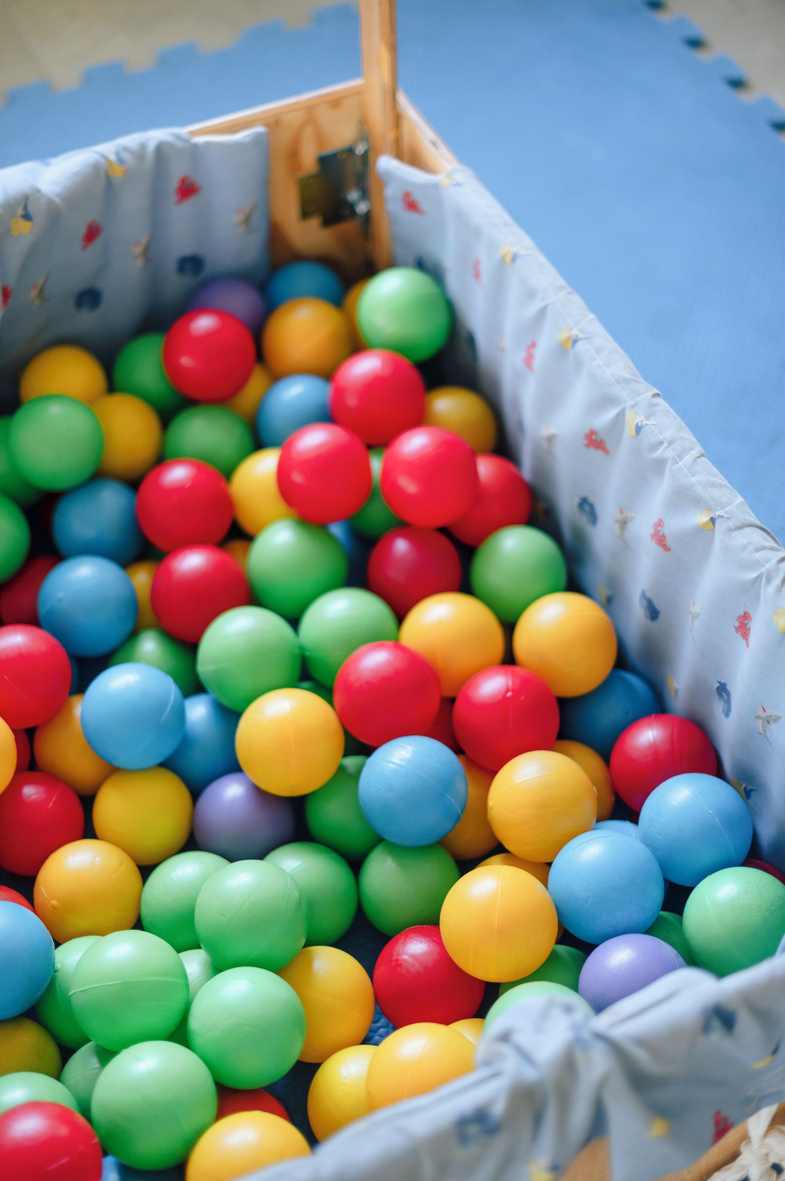 A colorful ball pit filled with multicolored balls.