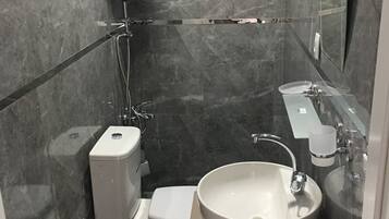 Shower, free toiletries, hair dryer, bathrobes