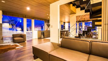 Una televisión de pantalla plana, Netflix, un reproductor de DVD