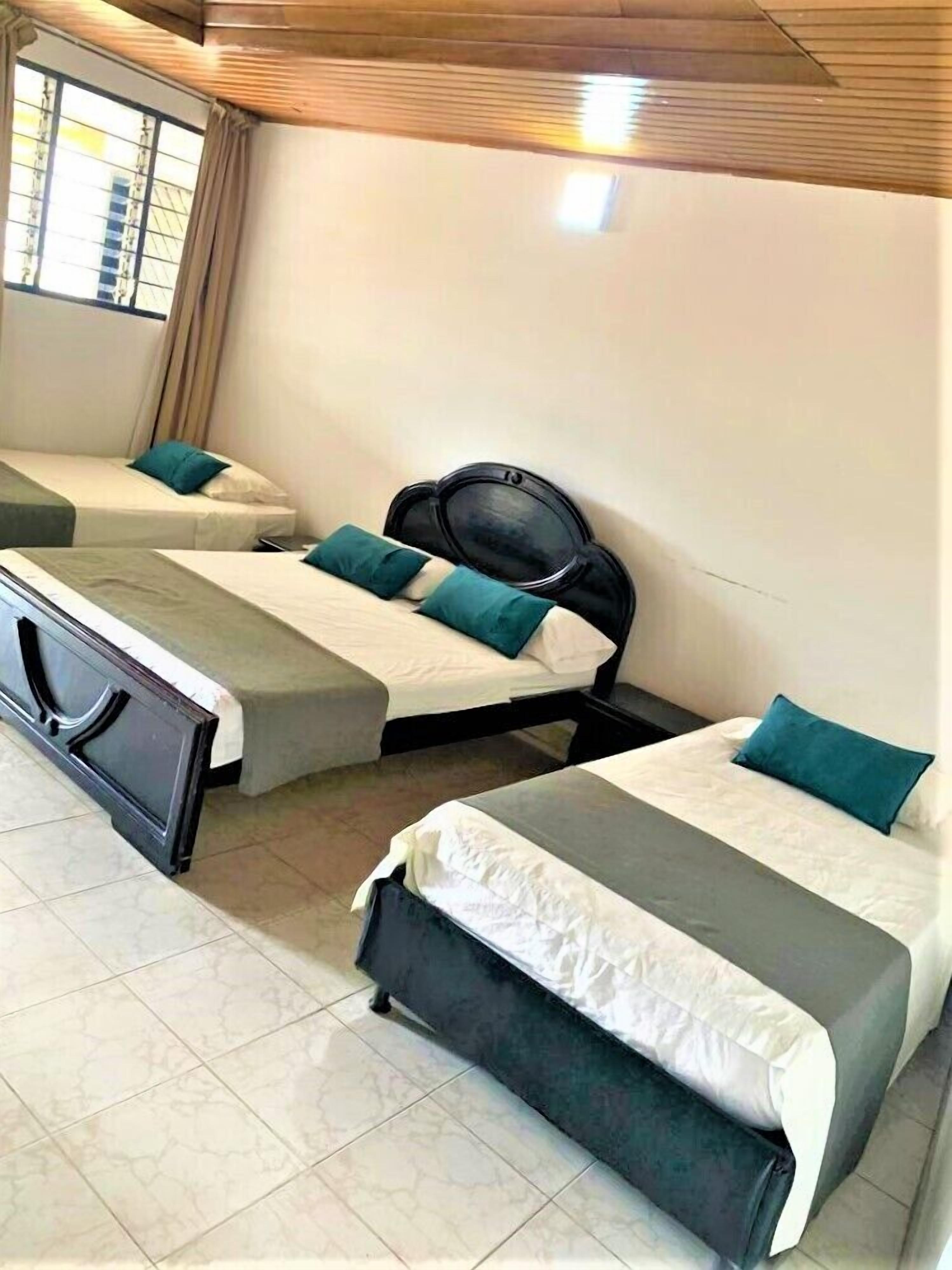 basic quadruple room, multiple beds, non smoking | 1 bedroom, egyptian cotton sheets, blackout curtains, free wifi