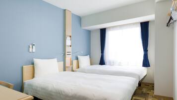 Desk, blackout curtains, iron/ironing board (on request), free WiFi