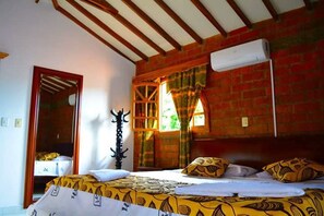 Suite | In-room safe, blackout curtains, iron/ironing board, free WiFi - Hostal Valle De Las Camelias (Pereira)