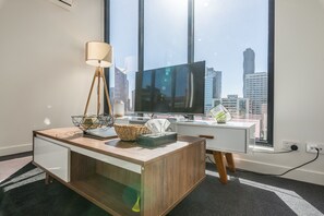 Basic Apartment, 2 Bedrooms, City View | Living area | Flat-screen TV - APC on Bourke (Melbourne)