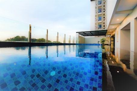 Outdoor pool. Hotel FortunaGrande Jember