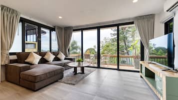 Standard Villa, 2 Bedrooms, Sea View | Living room | 55-inch flat-screen TV with cable channels, TV