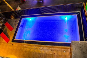 Outdoor pool, free pool cabanas, pool umbrellas