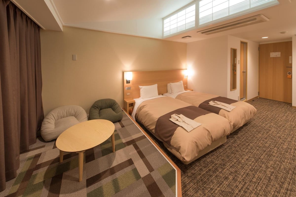 desk, laptop workspace, blackout curtains, iron/ironing board