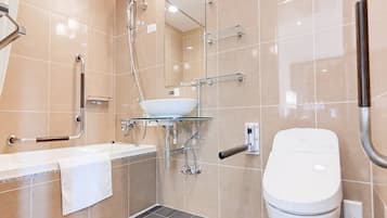 Combined shower/tub, deep soaking tub, free toiletries, hair dryer