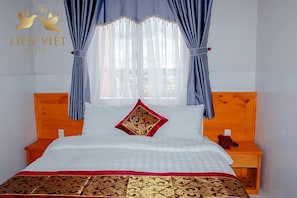 Kamar Double Deluks | Meja kerja, tirai kedap cahaya, Wi-Fi gratis, dan seprai linen