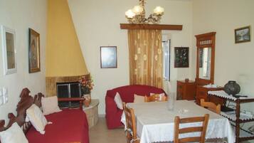House, Multiple Beds | Living area | Flat-screen TV