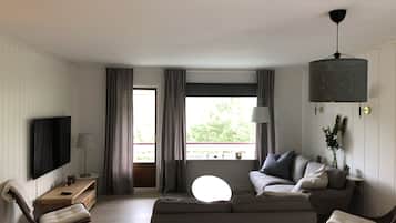 Exclusive Apartment, Multiple Beds, Non Smoking | Living room | Smart TV