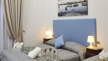 Deluxe-Dreibettzimmer | Allergikerbettwaren, Minibar, Zimmersafe, individuell eingerichtet