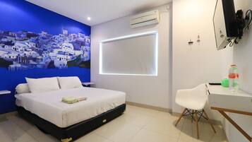Desk, laptop workspace, free WiFi, bed sheets
