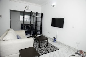 Standard Apartment | Living area | Flat-screen TV