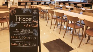 A TPlace Coffee & Touchdown Space sign with operating hours. - Toyoko Inn Shin Osaka Higashi Mikuni Station (Osaka)