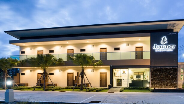 A modern two-story building with a sign for 'Journey Residence Phuket'. - Journey Residence Phuket  (Choeng Thale)