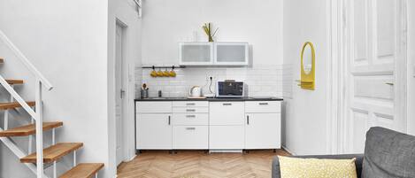 City Apartment, Multiple Beds | Private kitchen | Fridge, microwave, stovetop, coffee/tea maker