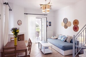 Duplex, Sea View (LIGHT BLUE MAISONETTE) | Living room | 32-inch flat-screen TV with digital channels, TV - Paktia Villas (Paros)