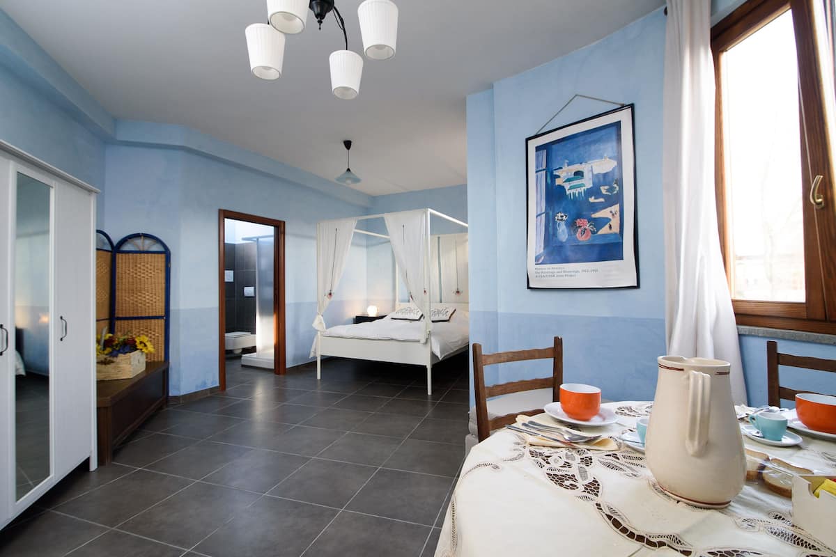 Habitación Deluxe con 1 cama matrimonial o 2 individuales, vista a la alberca | Wifi gratis, ropa de cama y acceso para silla de ruedas