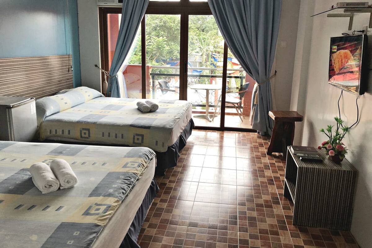 Cordoba | Desk, blackout drapes, iron/ironing board (on request), bed sheets