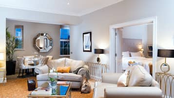 Luxury Apartment | Living area | 32-inch LCD TV with cable channels, TV, fireplace