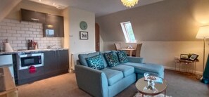 Cottage, 1 Bedroom (First Floor 1) | Living area | Flat-screen TV, fireplace, DVD player - Balmaha Lodges (Balmaha)