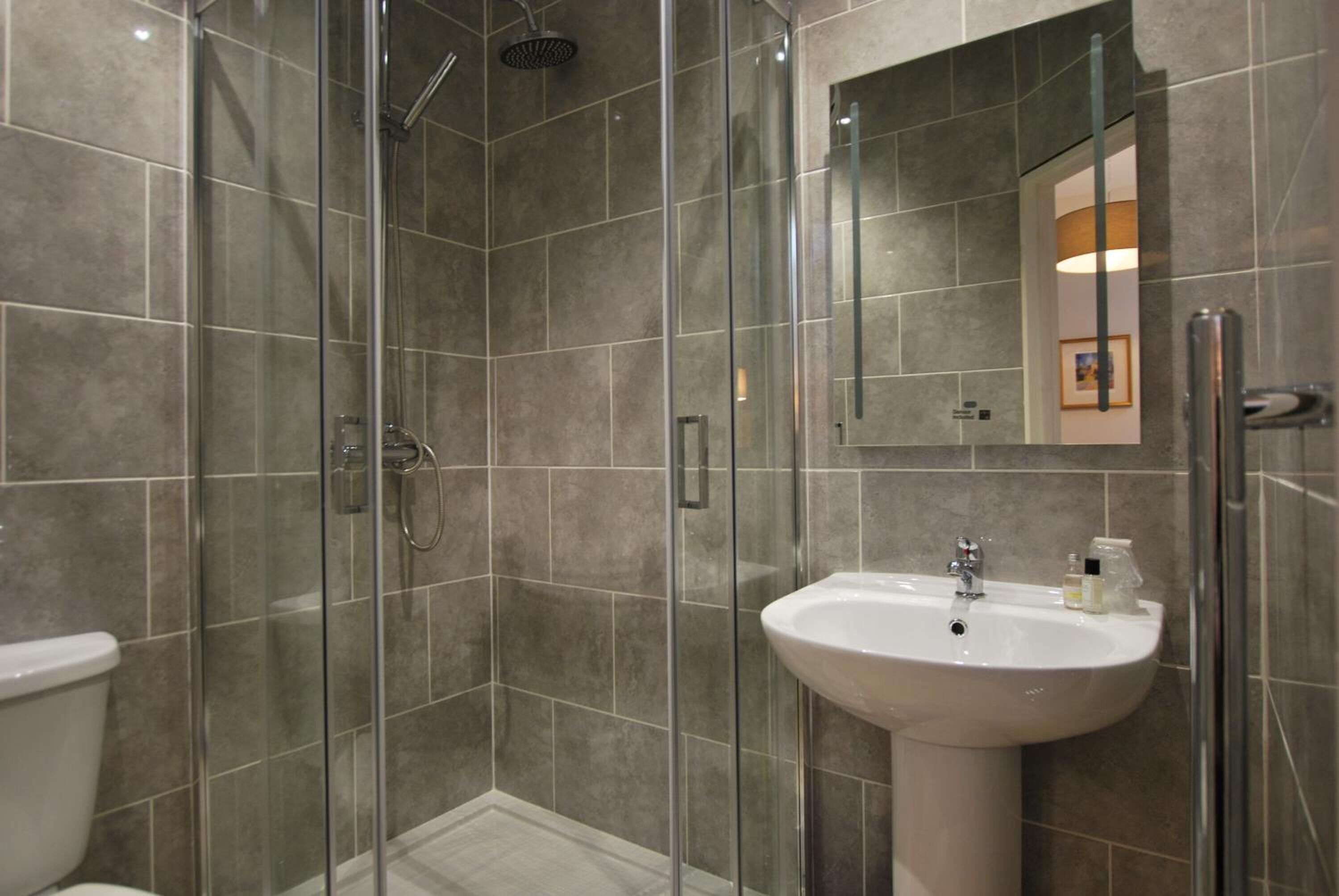 Shower, free toiletries, hair dryer, towels